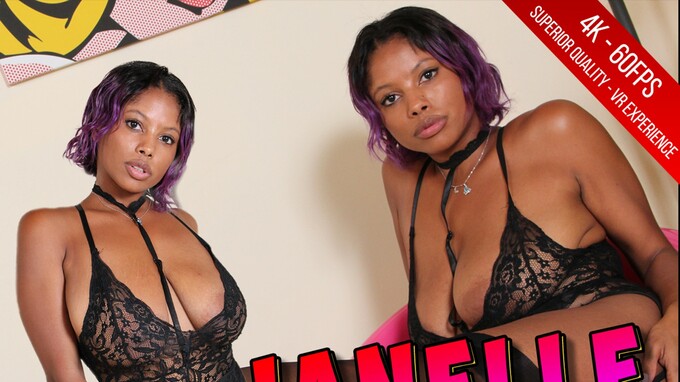 Sexy Janelle plays with a maxi dildo in black stockings